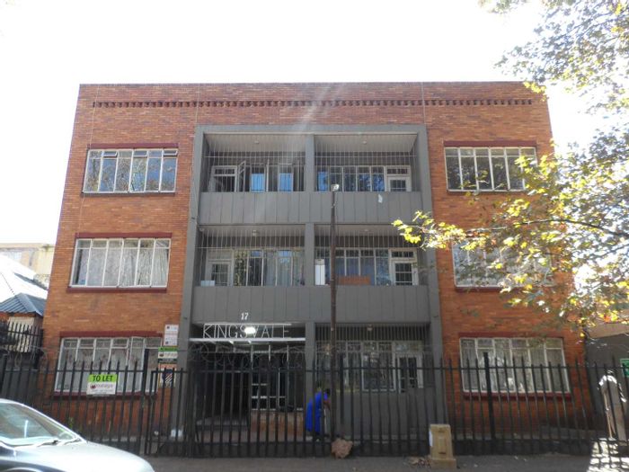 Yeoville Apartment For Sale: Versatile building near amenities and transport options.