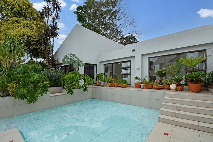 For Sale: House in Benmore Gardens with pool, study, and landscaped gardens.