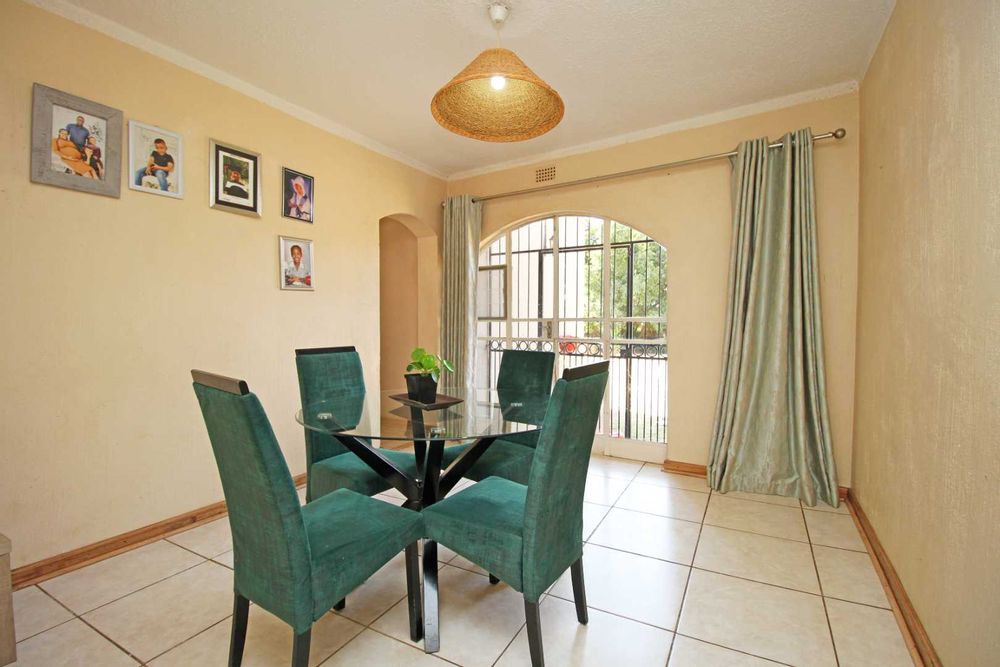 These glass doors in the Dining Room creates a seamless flow between indoor and outdoor spaces.  Opening up the home to enhance its aesthetic appeal and sense of space. The Dining Room creates versatility to braai in the Entertainment Area at the poolside and to dine at the dinner table with your family.  