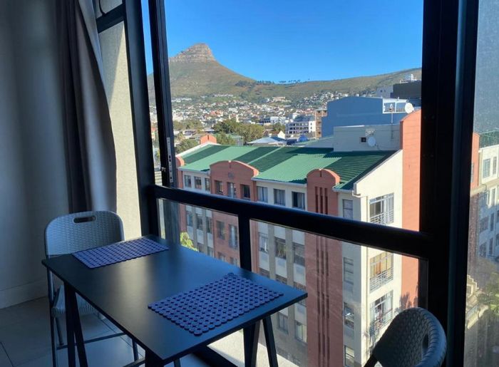 Zonnebloem Apartment For Sale: Front-facing studio, parking, security, views, storage.