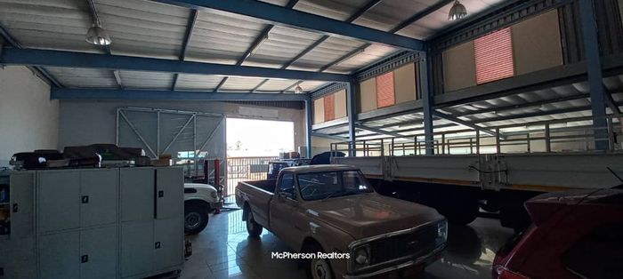 Retail Property For Sale in Windhoek Central: Drive-through warehouse, shaded parking, prime visibility.