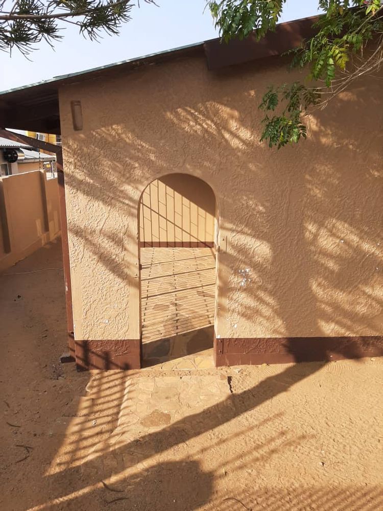 Backyard patio open entrance.