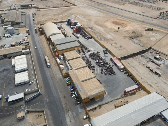 Heavy Industrial Property For Sale: Offices, multiple warehouses, and prime transport access.