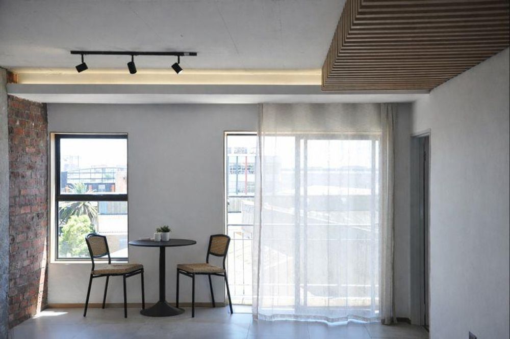 staged dining space in open plan lounge