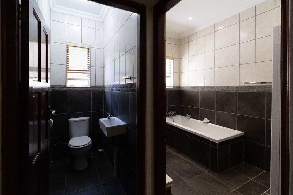 Family bathroom with separate toilet