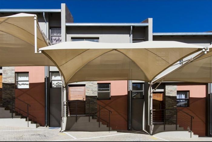 For Sale: Townhouse in Kleine Kuppe with secure access, private courtyard, and pet-friendly.