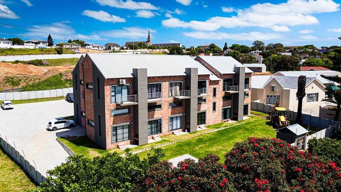 For Sale: Ground-floor apartment in Newton Park with outdoor braai and secure parking.