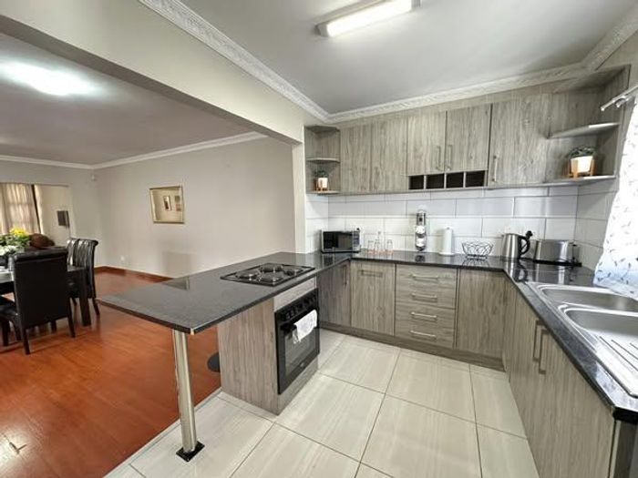 For Sale: Townhouse in Windhoek West with 3 bedrooms, private courtyard, and parking.