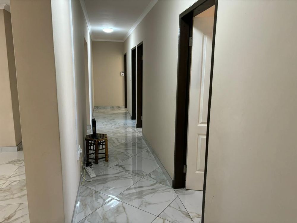 Hallway leading towards the bedrooms and bathrooms