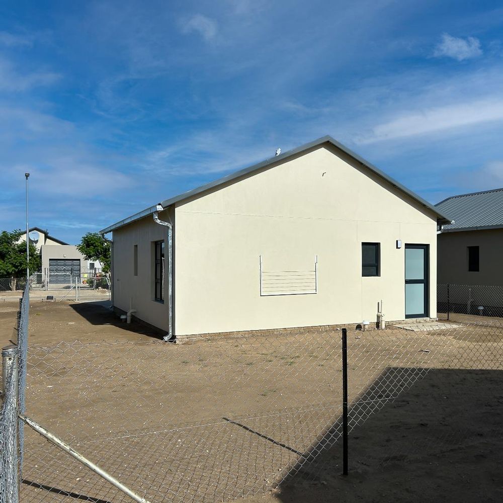 Freestanding townhouse with provision for future expansion.