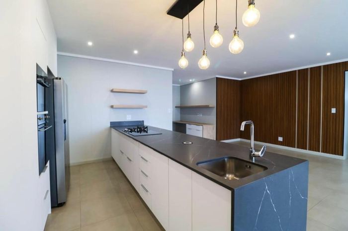 3 Bed Apartment To Rent in Olifantsfontein with Garage, Patio, and Estate Amenities.