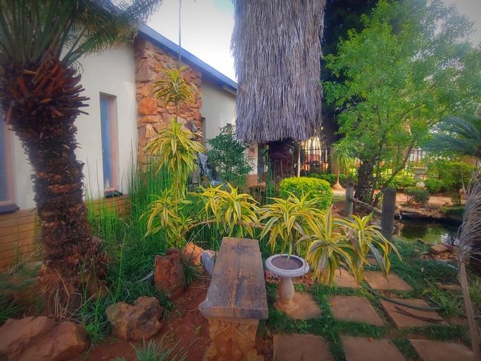 House for Sale in Jan Niemand Park: 4 Bedrooms, spacious living, versatile loft.