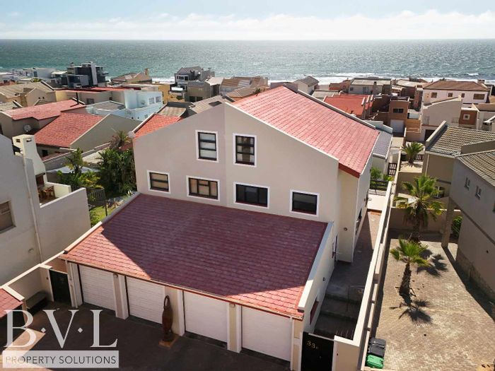 Long Beach House For Sale: Ocean views, entertainment studio, steps to sandy beach.