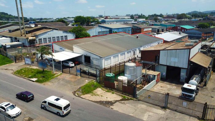 For Sale: Industrial property in Mountain Ridge with four units and ample parking.