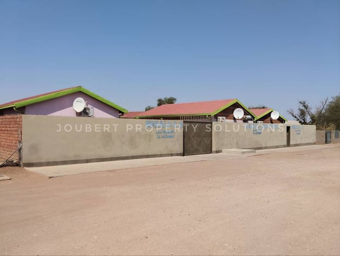 For Sale: Cluster Guesthouse in Mariental Central with multiple guestroom blocks and amenities.