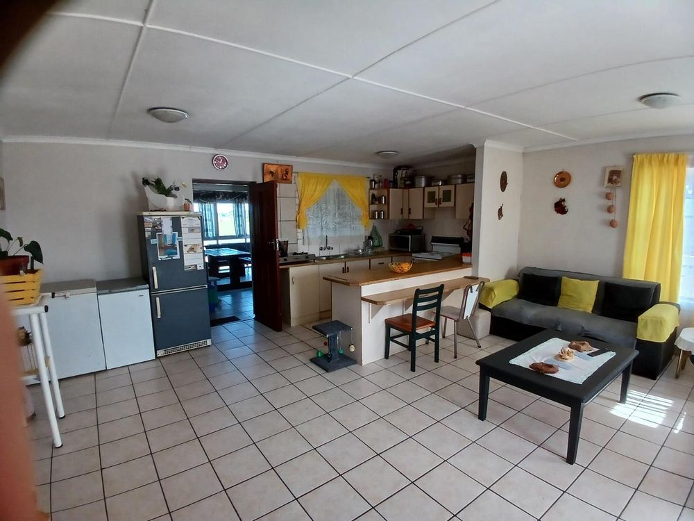 Same Main Living Area. Entrance to 2nd Living/BBQ Area on our left.