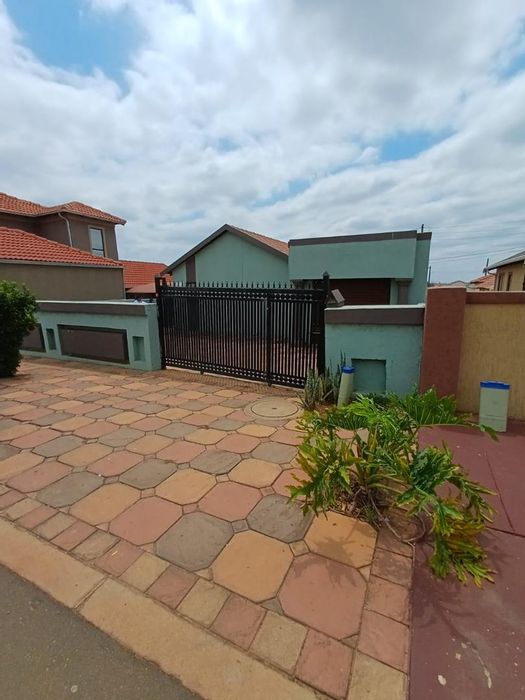 House For Sale in Mamelodi East: Two bedrooms, garage, outdoor toilet, secure yard.