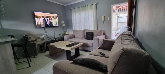 For Sale: Dorado Park Townhouse with 2 bedrooms, backyard, and carport.