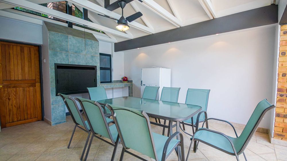 Braai area leads to grass play area for children