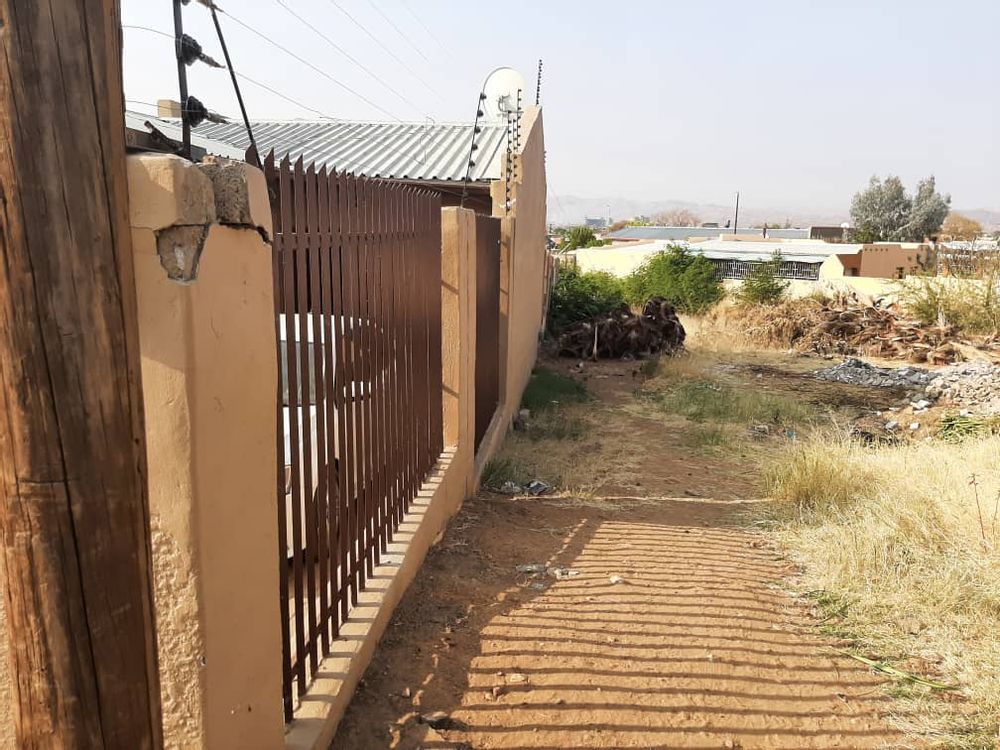 Side of the house and a vacant ERF