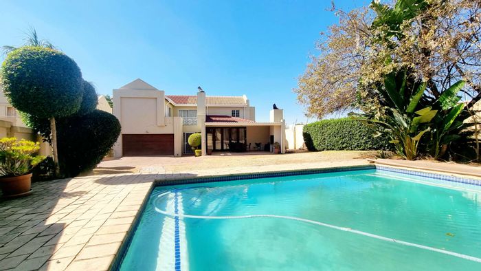 Equestria House For Sale: Garden, pool, double garages, open-plan living, spacious bedrooms.