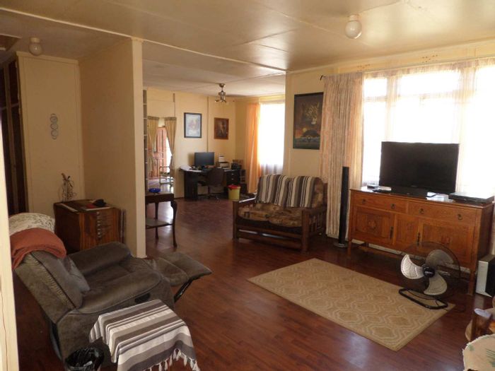 For Sale: Oviston House with 2 beds, 2 baths, cottage, garages, and fruit trees.