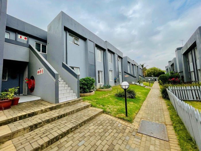 Pet-friendly townhouse in Mulbarton with private garden and communal pool for sale.