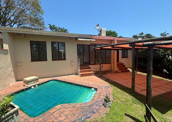 For Sale: 3-Bedroom Townhouse in Queensburgh Central with pool and garage amenities.