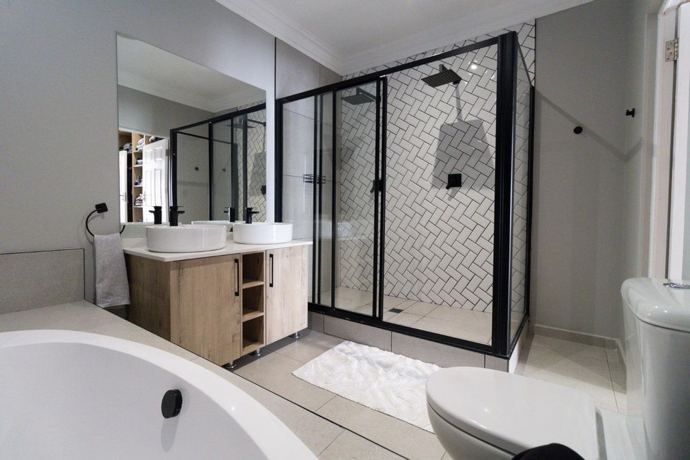 Main bathroom with luxury black fittings