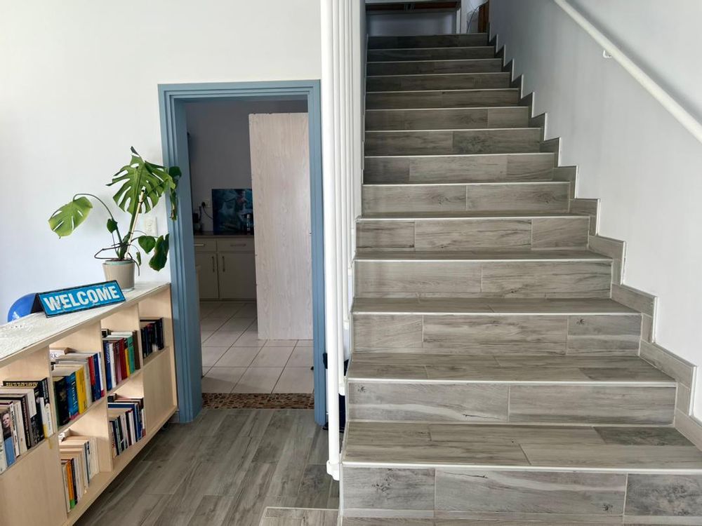 Stairs leading up to the kitchen, lounge and bedrooms