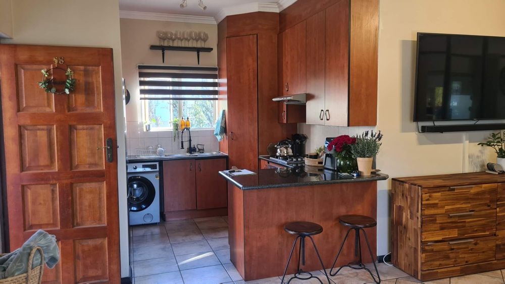 Kitchen with gas stove, pantry, 2 water appliance spaces, marble tops and good cupboard space