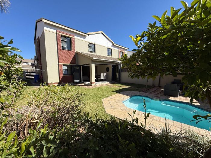 For Sale: Equestria Townhouse with garden, Jacuzzi pool, and 24-hour security.