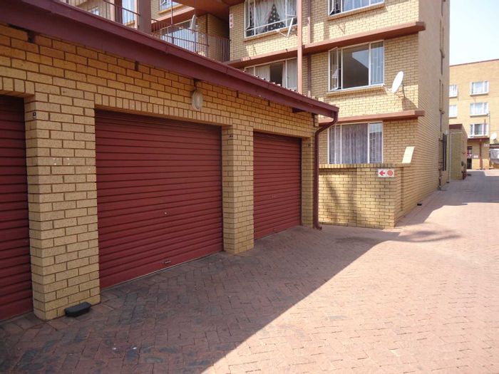 2-Bedroom Apartment For Sale in Pretoria Gardens with garage and spacious living area.