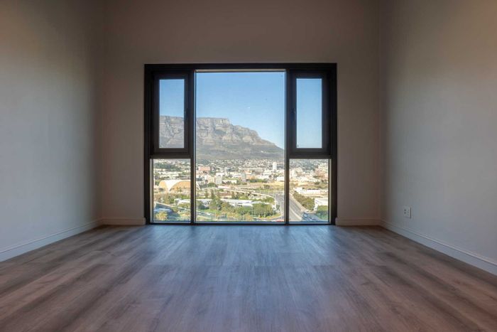 Foreshore Apartment For Sale: Loft design, pool, gym, and Table Mountain views.