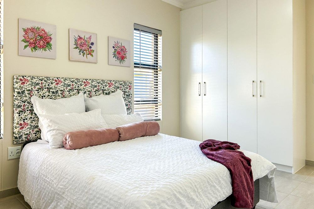 Main bedroom with built-in cupboards & ensuite.