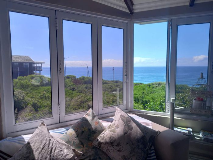 Tergniet House For Sale: Sea views, open-plan living, braai, greenbelt access.