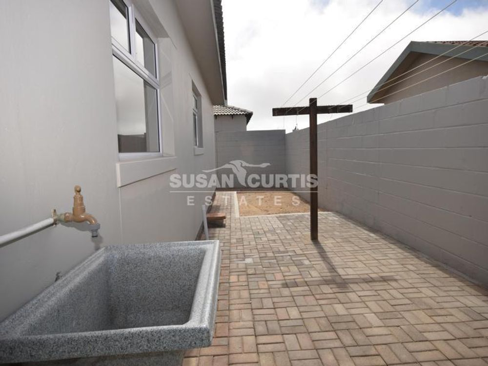 Dry yard with outside basin