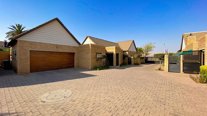 New Redruth Cluster For Sale: 3 beds, patio, braai, double garage, pet-friendly.
