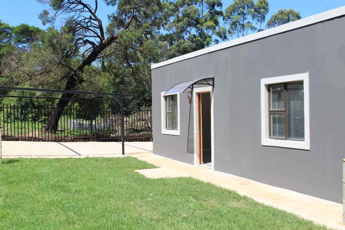 House To Rent in Waterfall Central: Aircon, pet-friendly garden, covered veranda with braai.