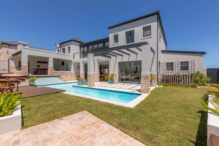 House To Rent in Atlantic Beach Golf Estate: 4 beds, pool, office, ocean views.