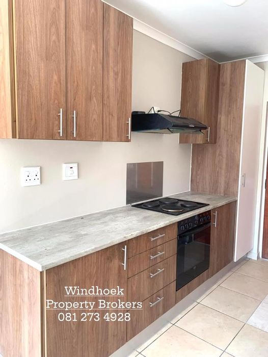 Apartment For Sale in Katutura: 2 Bedrooms, courtyard, parking, rental income opportunity.