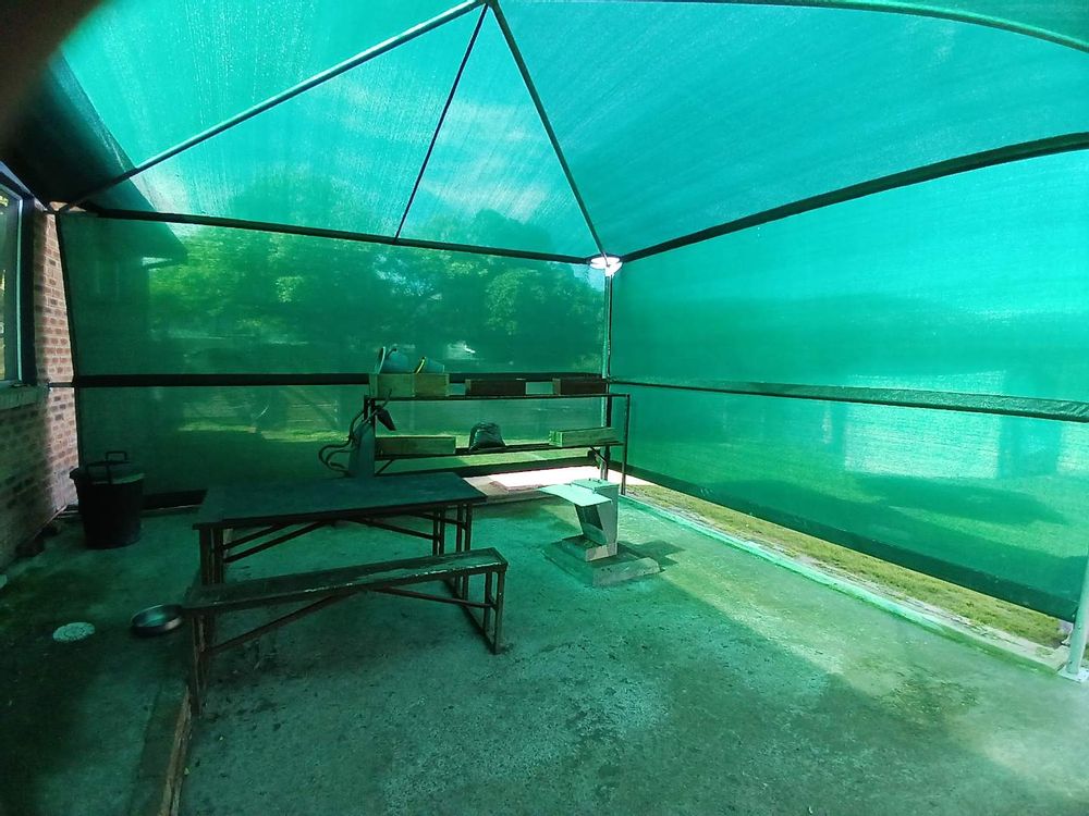 Shaded Area - accessed via 2nd Living Area & Backyard. Parking for 2 M/Vehicles.