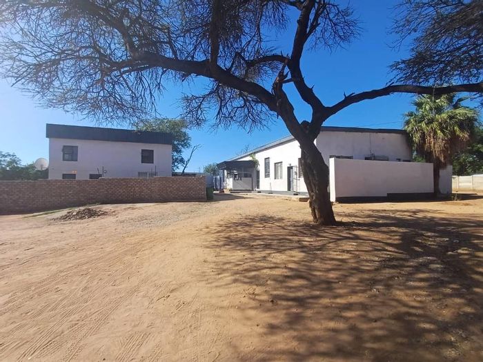 Tsumeb Central Business for Sale: 22 units, high rental income, CCTV, electric fence.