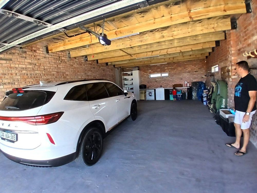 Our VERY spacious Garage - accommodating more than just 4 motor vehicles.