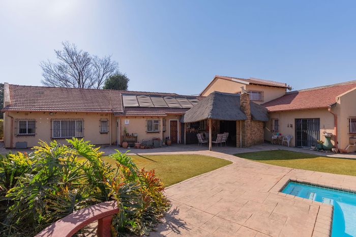 Edleen House For Sale: Five garages, heated pool, bar area, guest cottage.