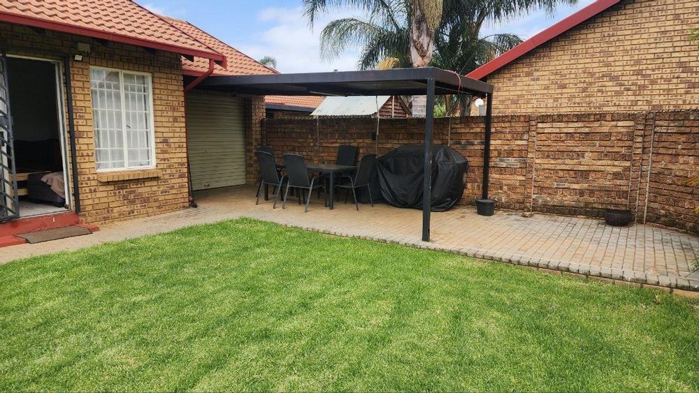 Covered Patio Leading from Hollywood Garage
