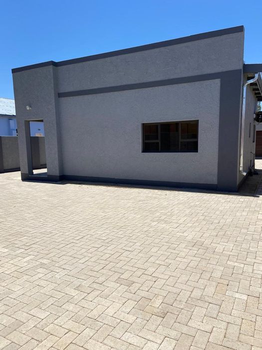 House For Sale in Khomasdal: 2 beds, interlocked, plus rental flats.