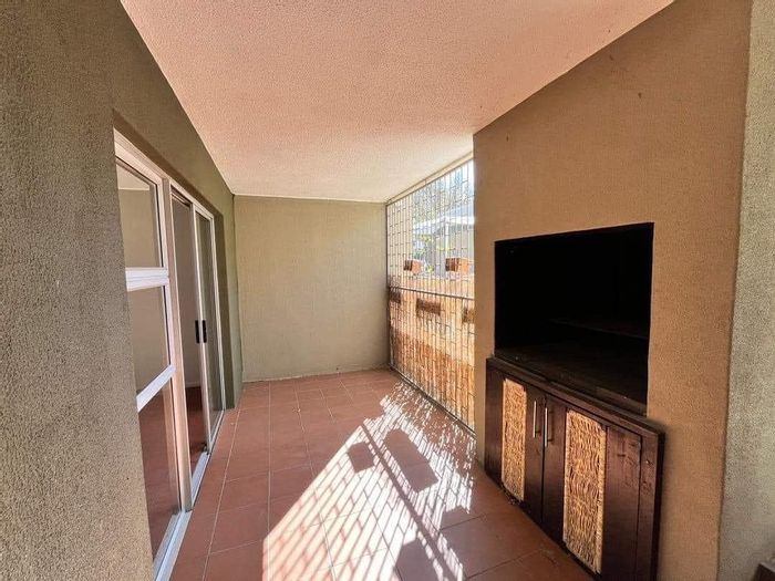 For Sale: Klein Windhoek Townhouse with pool, tennis courts, and BBQ patio.