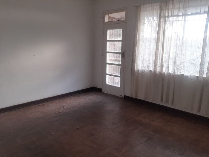 For Sale: 2-Bedroom Apartment in Rosettenville with Private Balcony and Secure Parking.