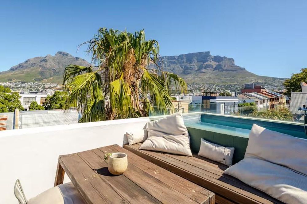 Private rooftop pool terrace with glorious Table Mountain, Lions Head and Devils Peak views